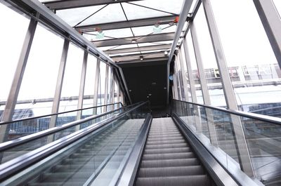 Low angle view of empty escalator