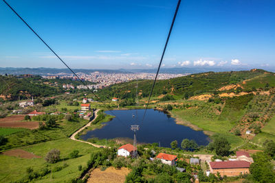 Aerial view of townscape against sky