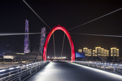 View of suspension bridge at night