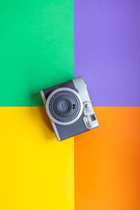 High angle view of telephone on table against wall