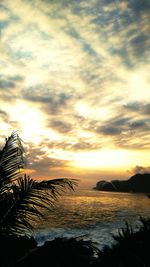 Scenic view of sea against sky at sunset