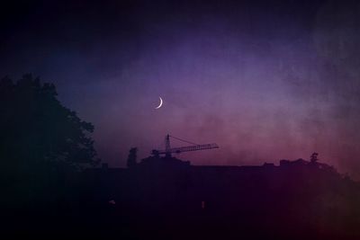 Low angle view of building against cloudy sky