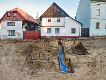 Pipes tap between main water tube and house. rebuilding of potable water system in historical town