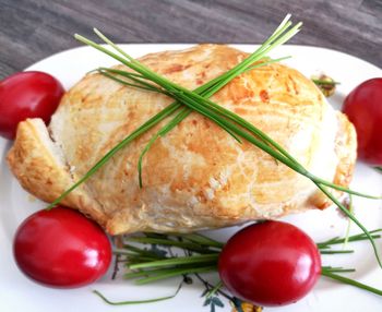 High angle view of tomatoes in plate on table