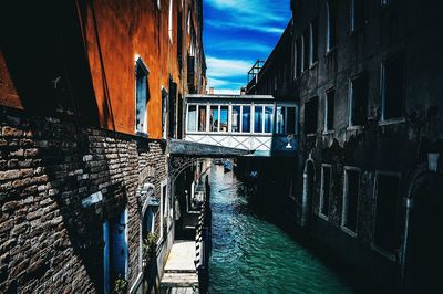 Canal by sea against sky