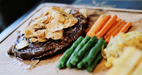 Close-up of food served on tray