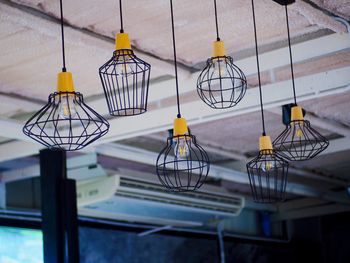 Low angle view of lights hanging from ceiling