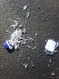 Close-up of garbage on beach