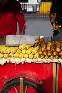 Midsection of man preparing food