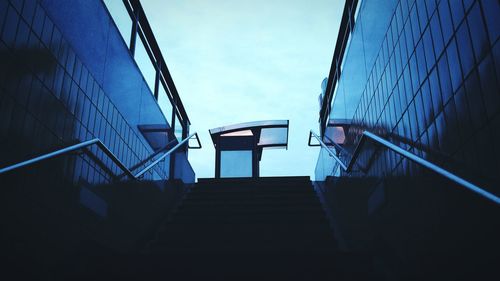 Low angle view of staircase against sky