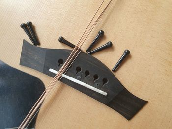 High angle view of piano keys on table