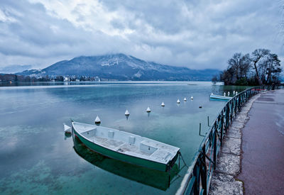 Lone boat moored in calm lake