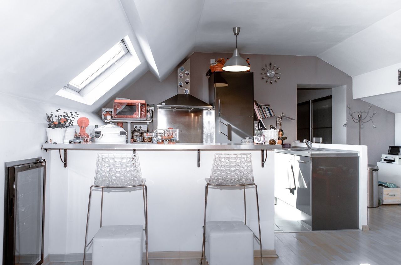 indoors, home, domestic room, home interior, illuminated, kitchen, lighting equipment, furniture, no people, white color, domestic kitchen, table, appliance, flooring, home showcase interior, modern, absence, ceiling, household equipment, day, luxury, electric lamp, tiled floor