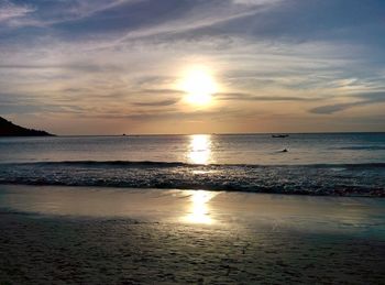 Scenic view of sea against sky at sunset