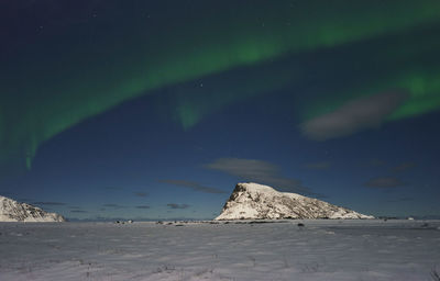 Scenic view of sea against sky at night