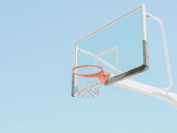 Low angle view of basketball hoop against sky