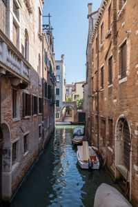 Canal amidst residential buildings