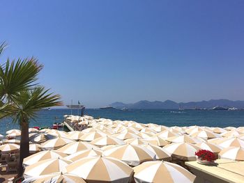 Umbrellas at restaurant on pier