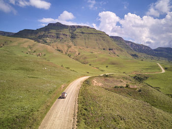 Driving on a dirt road to drakensberg