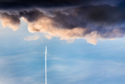 Low angle view of vapor trail in sky