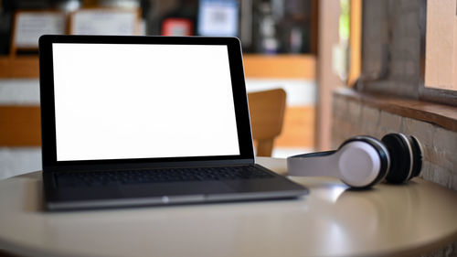 Close-up of laptop on table