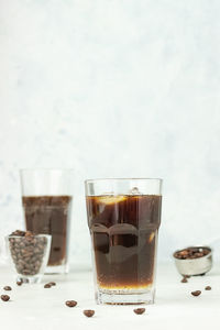 Espresso tonic, refreshment summer drink with tonic water, coffee and ice. trendy coffee drink.