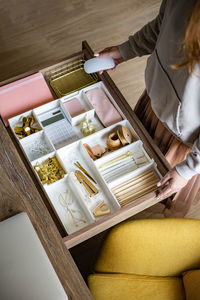 High angle view of woman preparing food on table