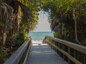 Pier over sea against sky