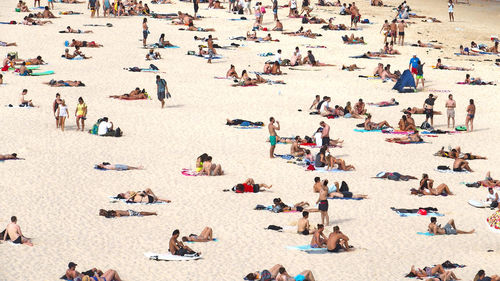 People relaxing at beach