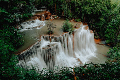 Scenic view of waterfall in forest