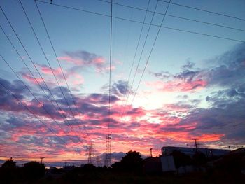 Low angle view of dramatic sky during sunset