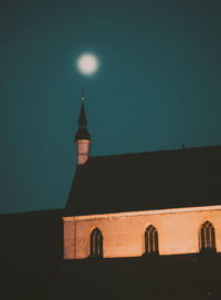 Low angle view of building against sky at night