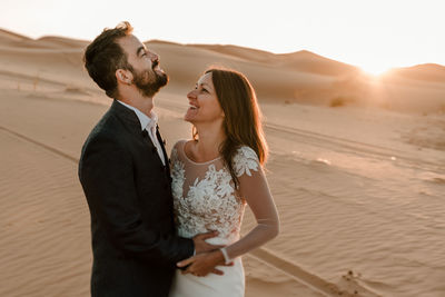 Young couple standing outdoors