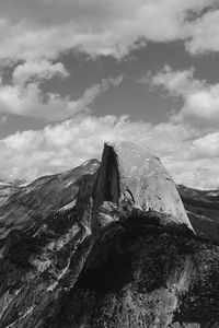 Low angle view of rock formation against sky