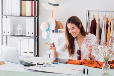 Young woman working on table