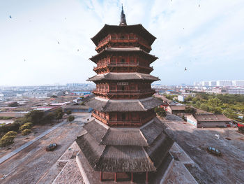 Panoramic view of buildings against sky in city