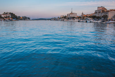 View of buildings in city at waterfront