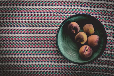 High angle view of fruits in bowl on table