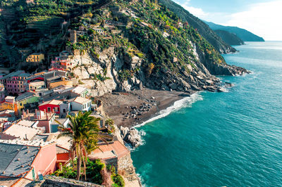 High angle view of town by sea