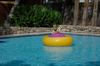 High angle view of swimming in pool