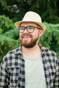 Portrait of young man wearing hat