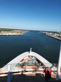 High angle view of sea against clear blue sky