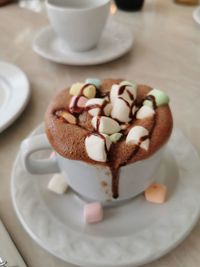 Close-up of coffee cup on table