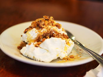 Close-up of breakfast in plate on table