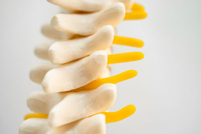 Close-up of pills against white background