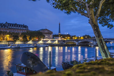 View of bridge over river in city