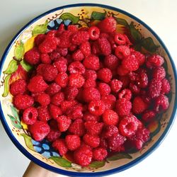 High angle view of strawberries in bowl