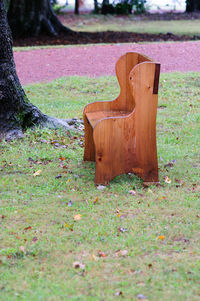 Wooden fence on grassy field