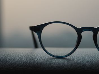 Close-up of eyeglasses on table