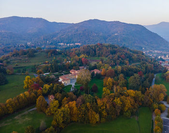 High angle view of trees and mountains against sky